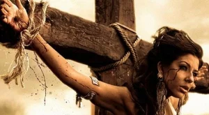 Андреа разпъната на кръст като Христос