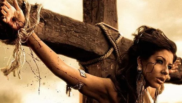 Андреа разпъната на кръст като Христос