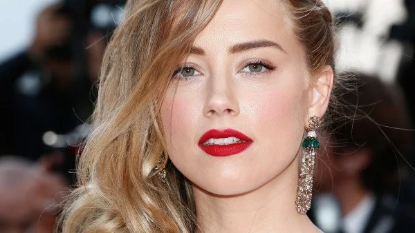 Амбър Хърд удряла бившата си половинка