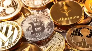Криптовалутите поеха надолу след пиковите стойности в началото на годината